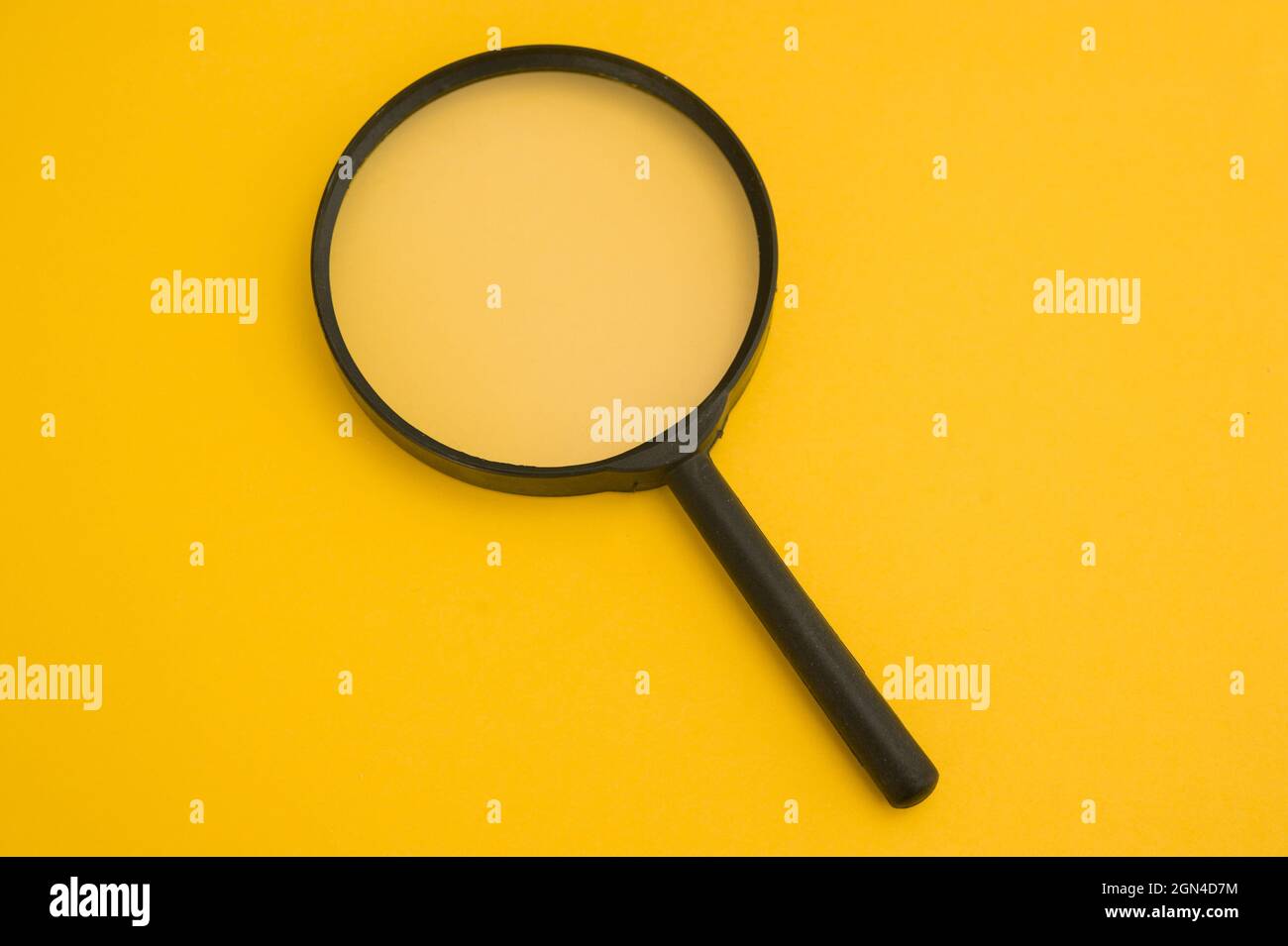 una lente di ingrandimento Foto Stock