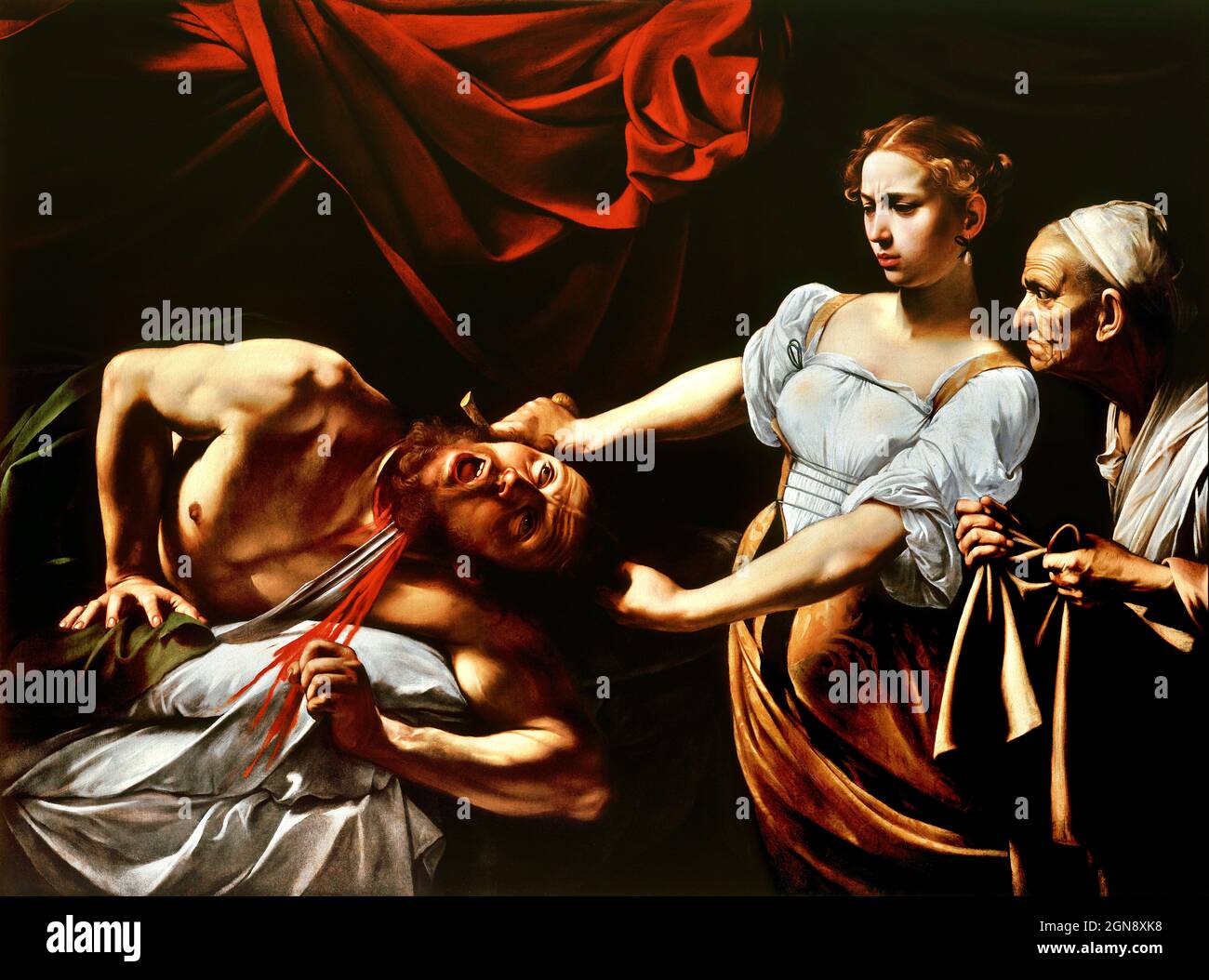 Caravaggio - Judith Beheading Holofernes - Caravaggio - (c.1598-9). Foto Stock