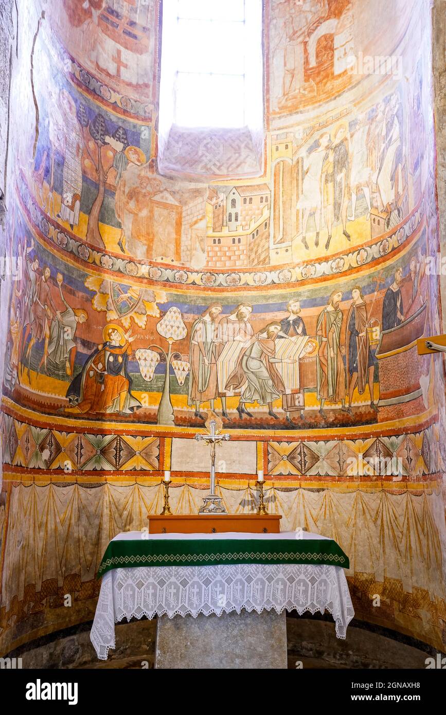 Lapidazione di Santo Stefano, particolare di affresco nell'abside meridionale. La più grande serie di murales figurativi della Svizzera, dipinti c.. A.D. 800 e romanico f Foto Stock