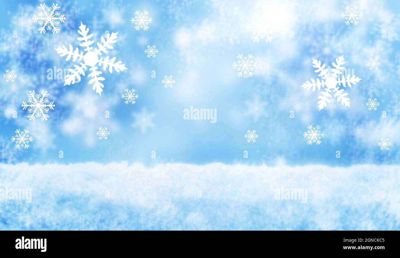 Capodanno e Natale Blurred soft card con fiocchi di neve. Sfondo neve blu inverno. Foto Stock