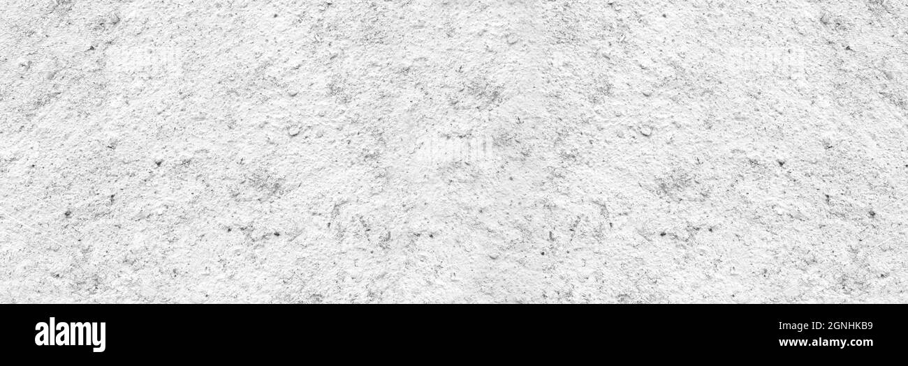 Superficie panoramica della parete in cemento bianco per lo sfondo della texture di design. Foto Stock