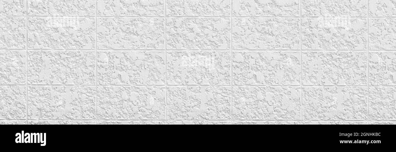 Panorama superficie bianca di vecchio sfondo in cemento resistente agli agenti atmosferici per il design. Foto Stock