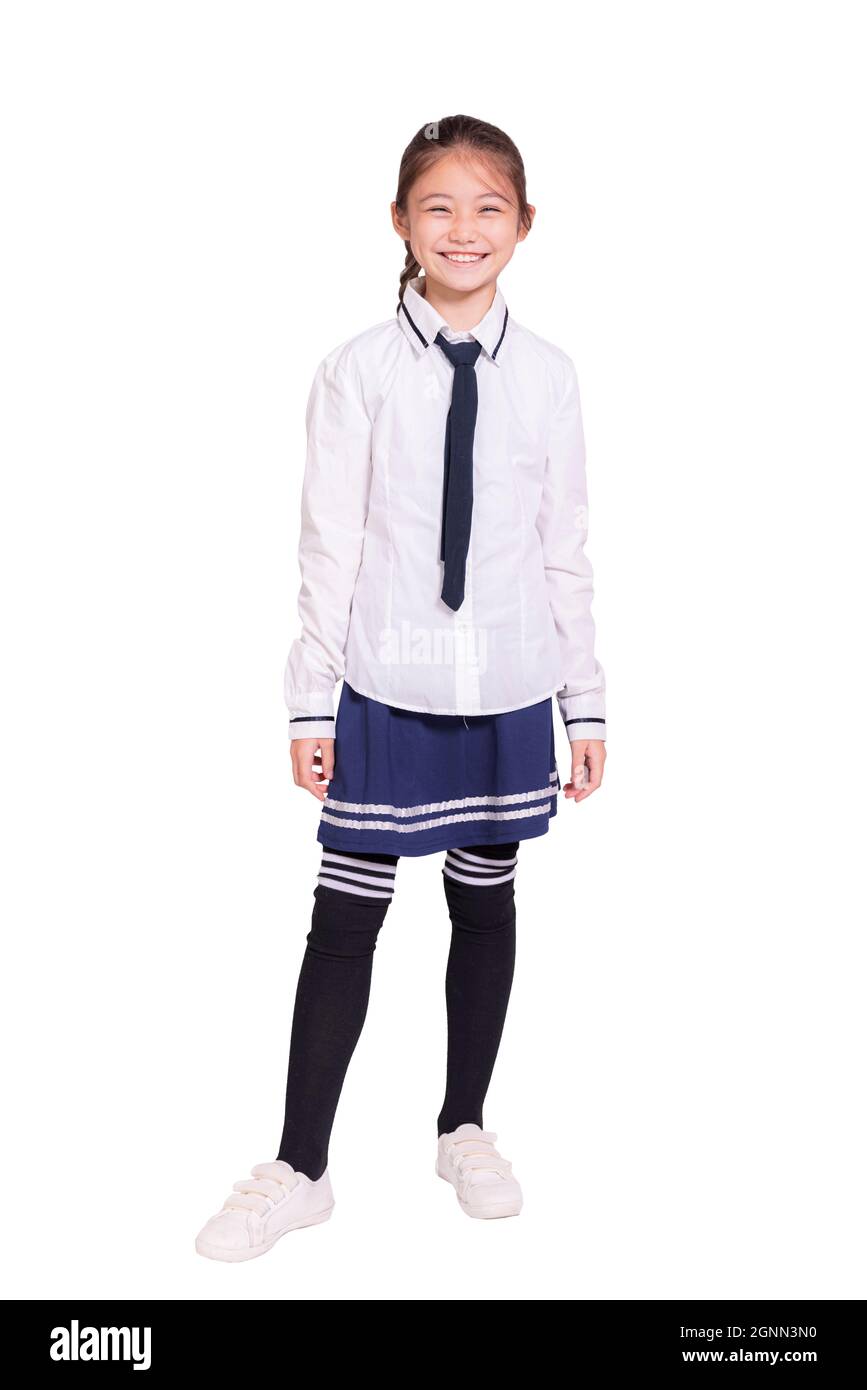 Felice studentessa ragazza che indossa uniforme.isolato su sfondo bianco. Foto Stock