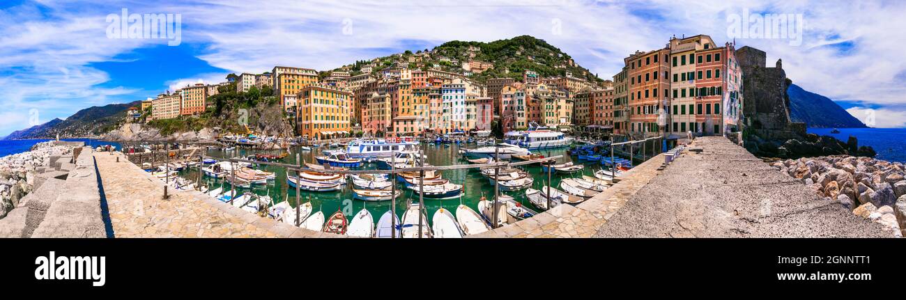 Camogli - bellissima città colorata in Liguria, panorama con barche da pesca tradizionali. Popolare destinazione turistica in Italia Foto Stock
