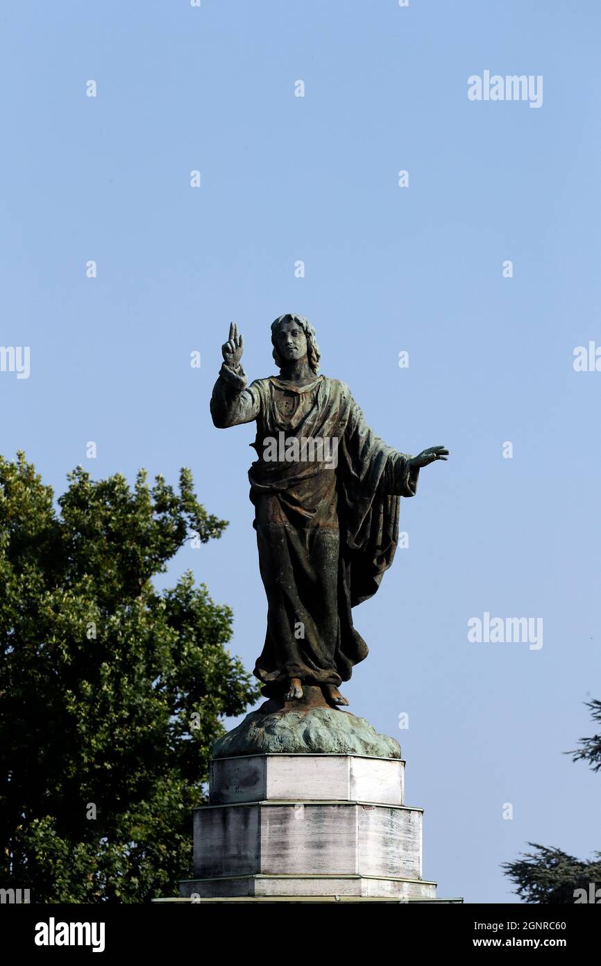 Cimitero monumentale. Statua di Gesù. Milano. Italia. Foto Stock