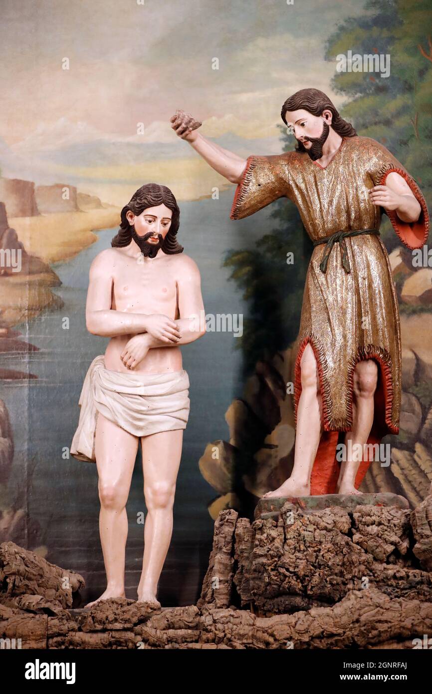 Chiesa di San Francesco. Il Battesimo di Cristo di Giovanni Battista nell'acqua del fiume Giordano. Evora. Portogallo. Foto Stock