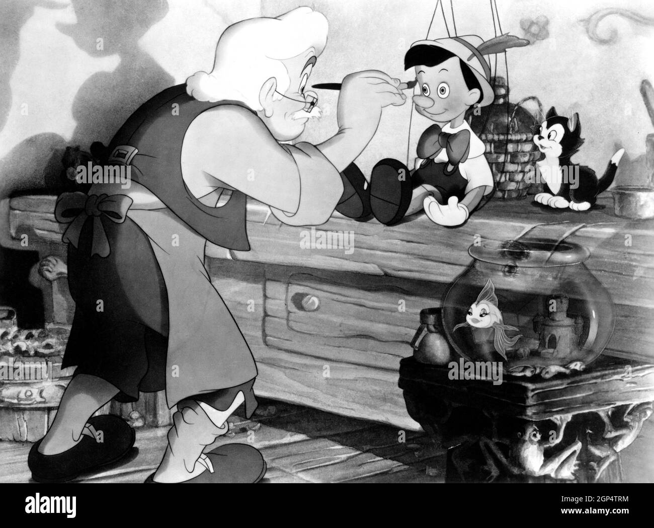 PINOCCHIO, da sinistra, Gepetto (voce di Christian Rub), Pinocchio (voce di  Dickie Jones), Cleo il pesce