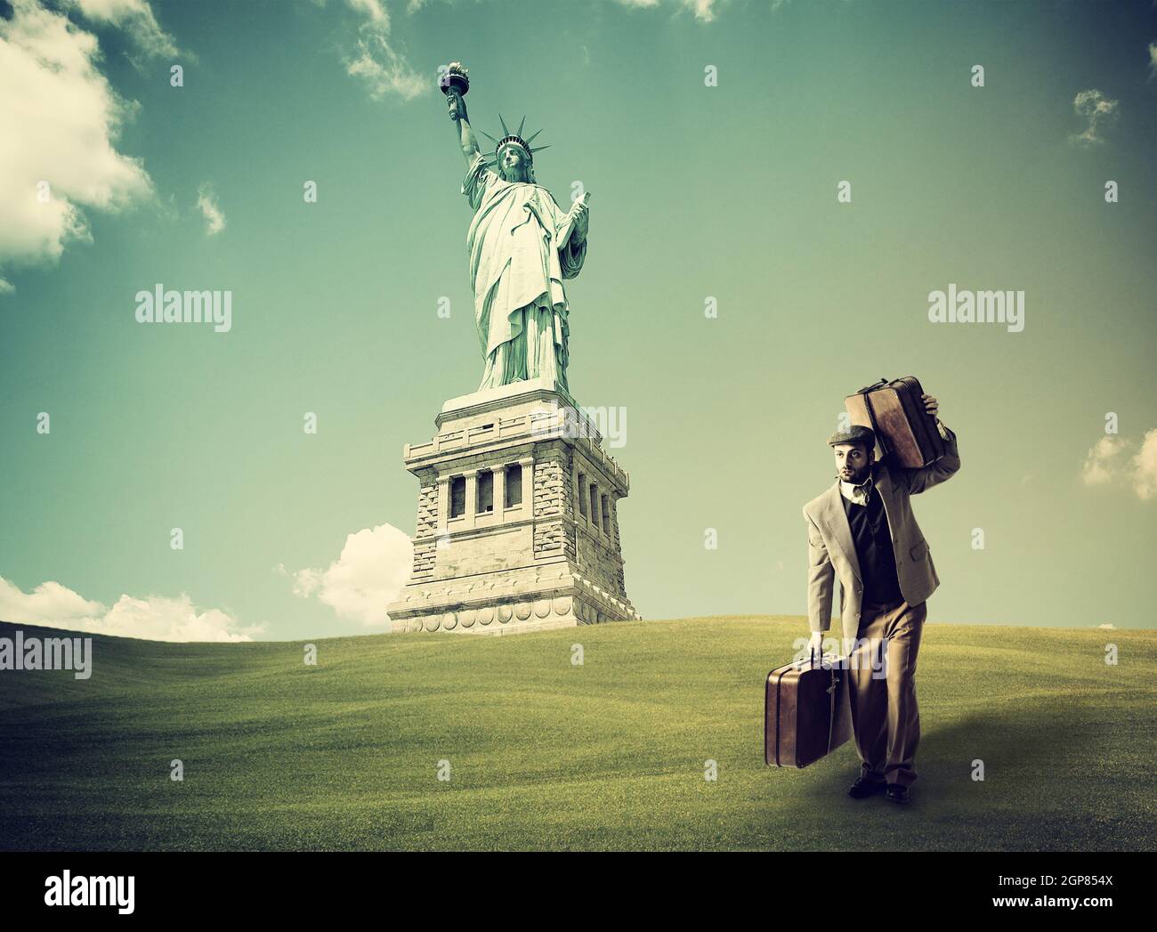 Immigrato con le valigie per giungere a New York Foto Stock