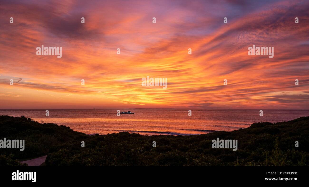 Tramonto al Montauk Point Light è un faro situato adiacente al Montauk Point state Park, nel punto più orientale di Long Island, nel borgo Foto Stock