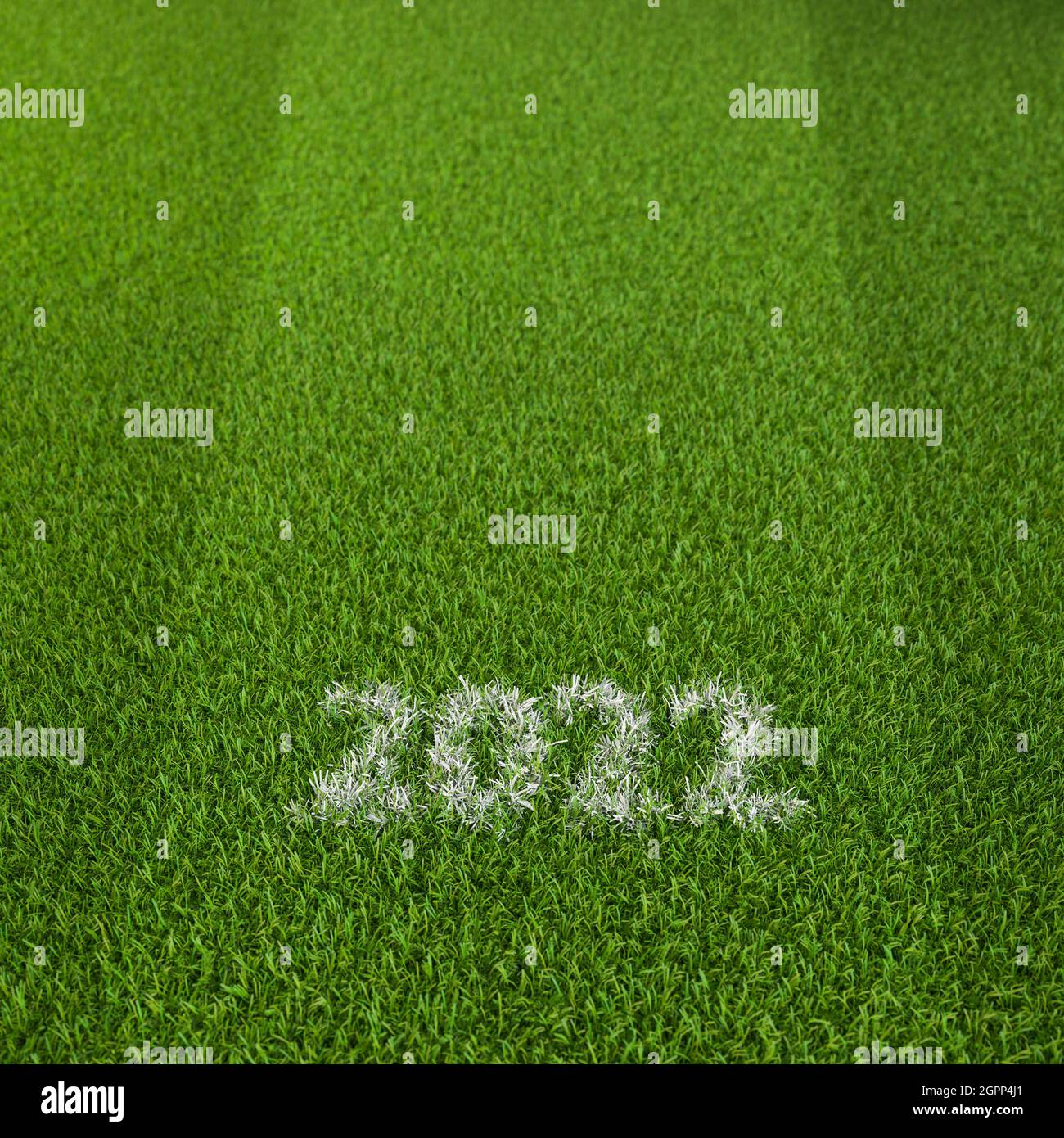 L'anno 2022 come linea gesso su uno stadio verde. Concetto per tutti gli eventi di calcio o calcio, campionati o tornei dell'anno 2022. Spazio di copia a Foto Stock