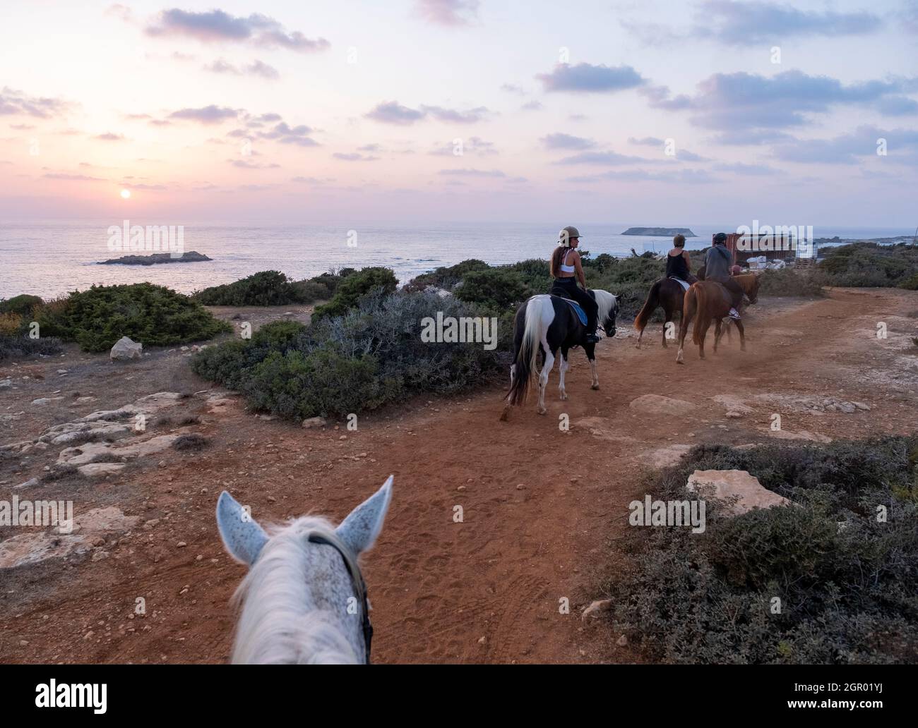 Georges Ranch equitazione tramonto trekking, Peyia, Paphos, Cipro. Foto Stock