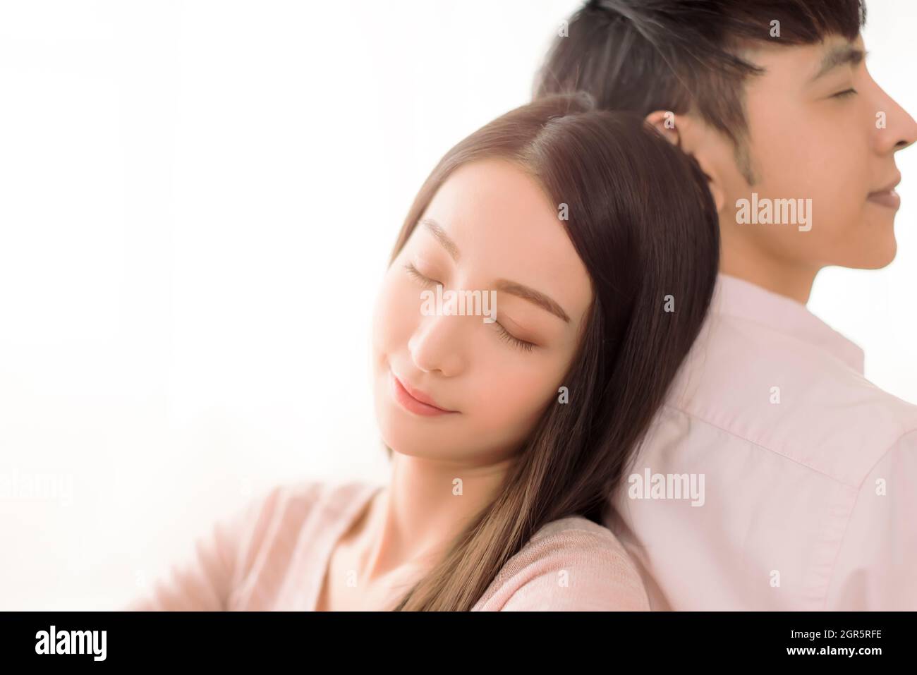 Primo piano di una bella coppia sorridente Foto Stock