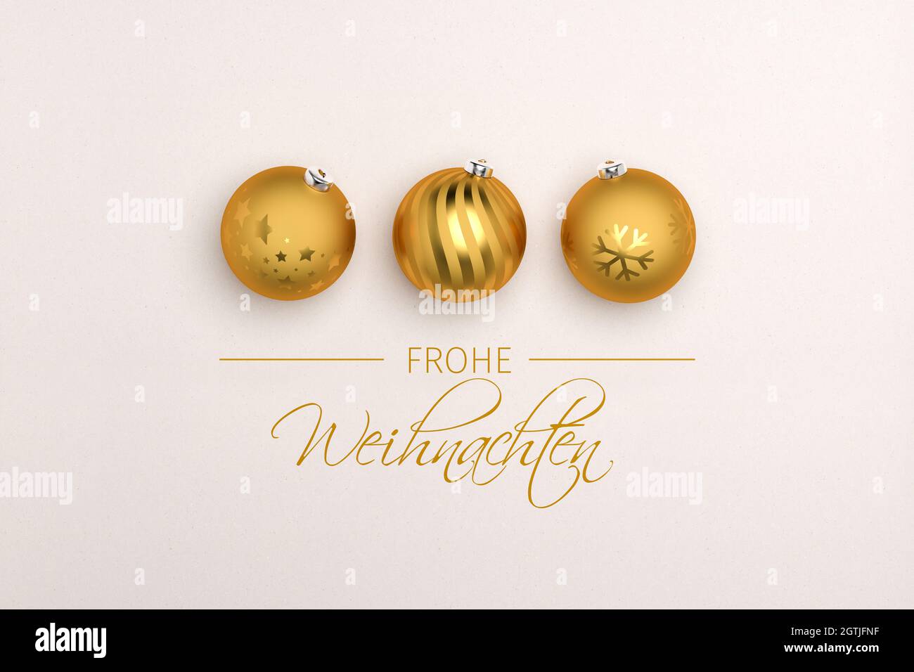Tre baubles dorati di natale su sfondo cartaceo. Messaggio tedesco 'Frohe Weihnachten' (buon Natale) qui sotto. Foto Stock