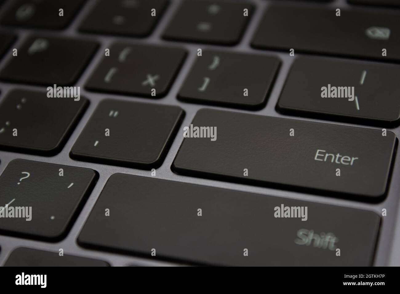 I tasti neri piatti della tastiera del computer portatile si avvicinano Foto Stock