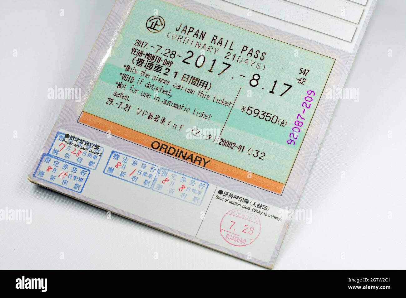Biglietto per il Japan Rail Pass su sfondo bianco. Foto Stock