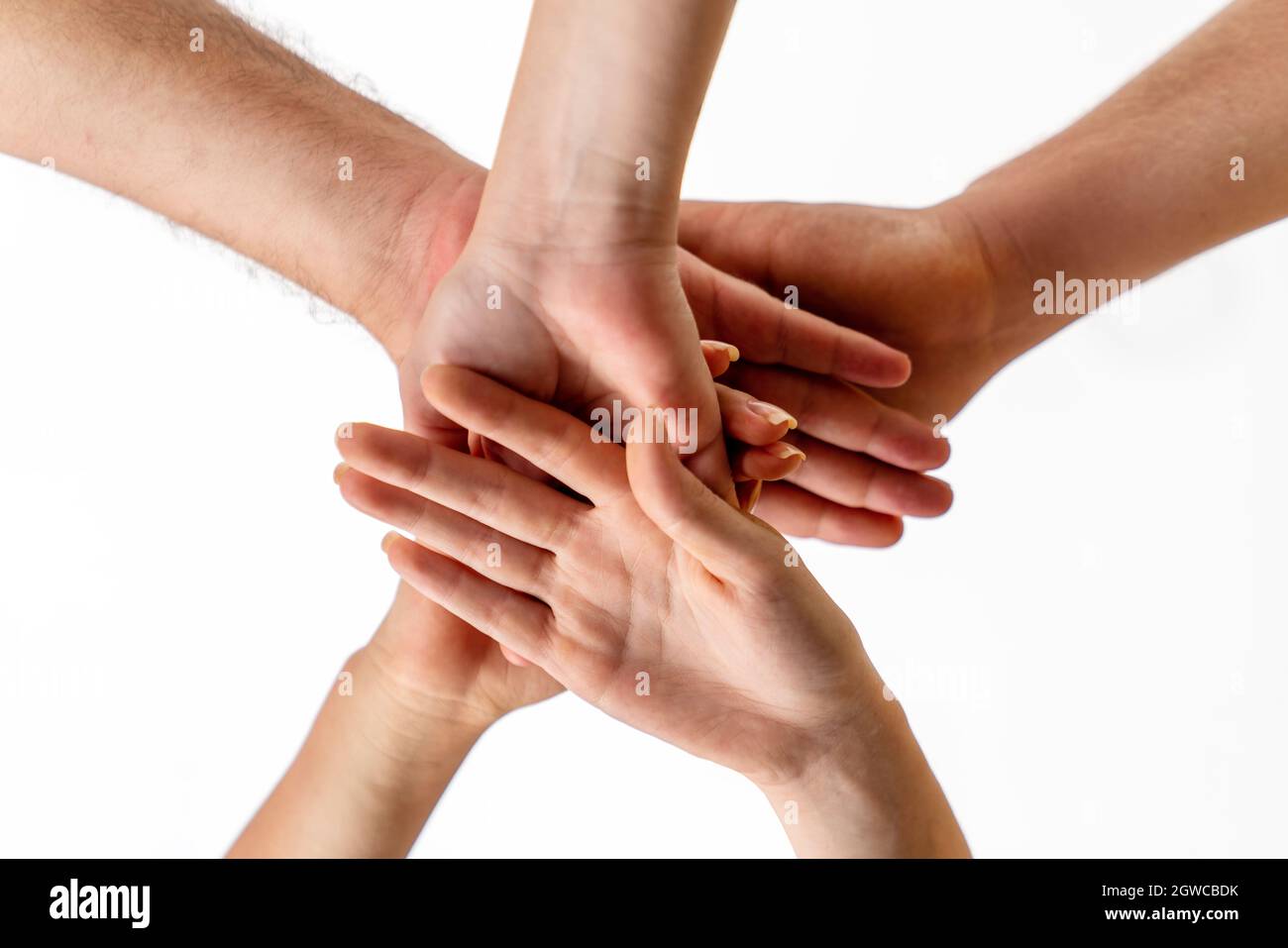 Le mani di un gruppo che fanno il lavoro di squadra per il successo al successo . Foto di alta qualità Foto Stock