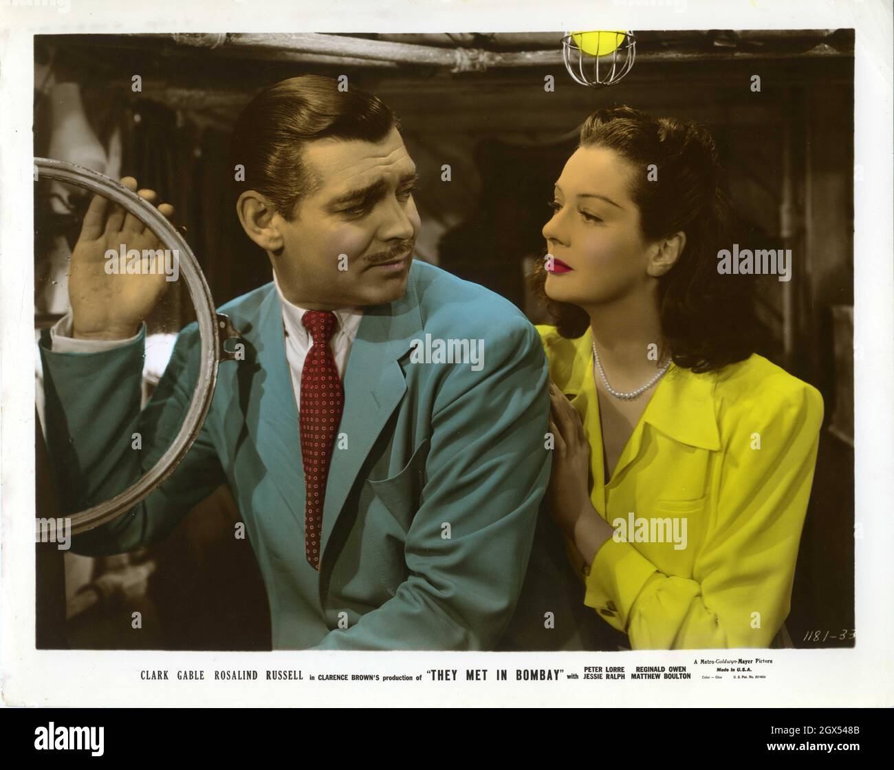 CLARK GABLE e ROSALIND RUSSELL si SONO INCONTRATI IN BOMBAY 1941 regista CLARENCE BROWN sceneggiatura Edwin Justus Mayer Anita loos e Leon Gordon basato su una storia di John H. Kafka Gowns Gilbert Adrian produttore Hunt Stromberg Metro Goldwyn Mayer Foto Stock