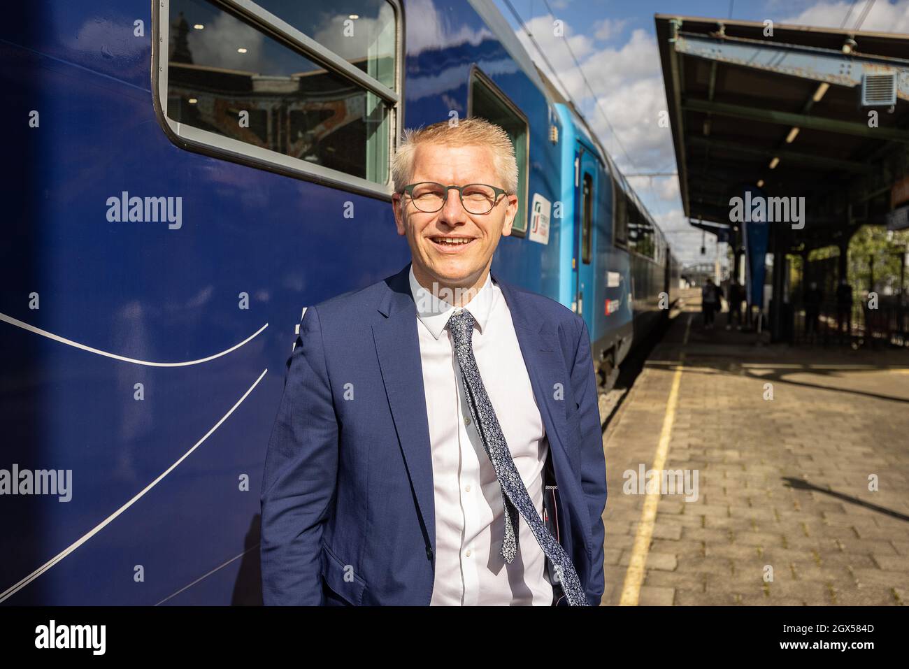 Il vice primo ministro e ministro della mobilità Georges Gilkinet pone al fotografo durante l'arrivo del treno "Connecting Europe Express" al Trai Foto Stock