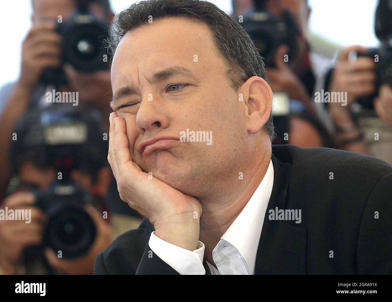 Tom Hanks ad una fotocall per il suo film The Ladykillers, parte del Festival del Cinema di Cannes 2004, Francia Foto Stock