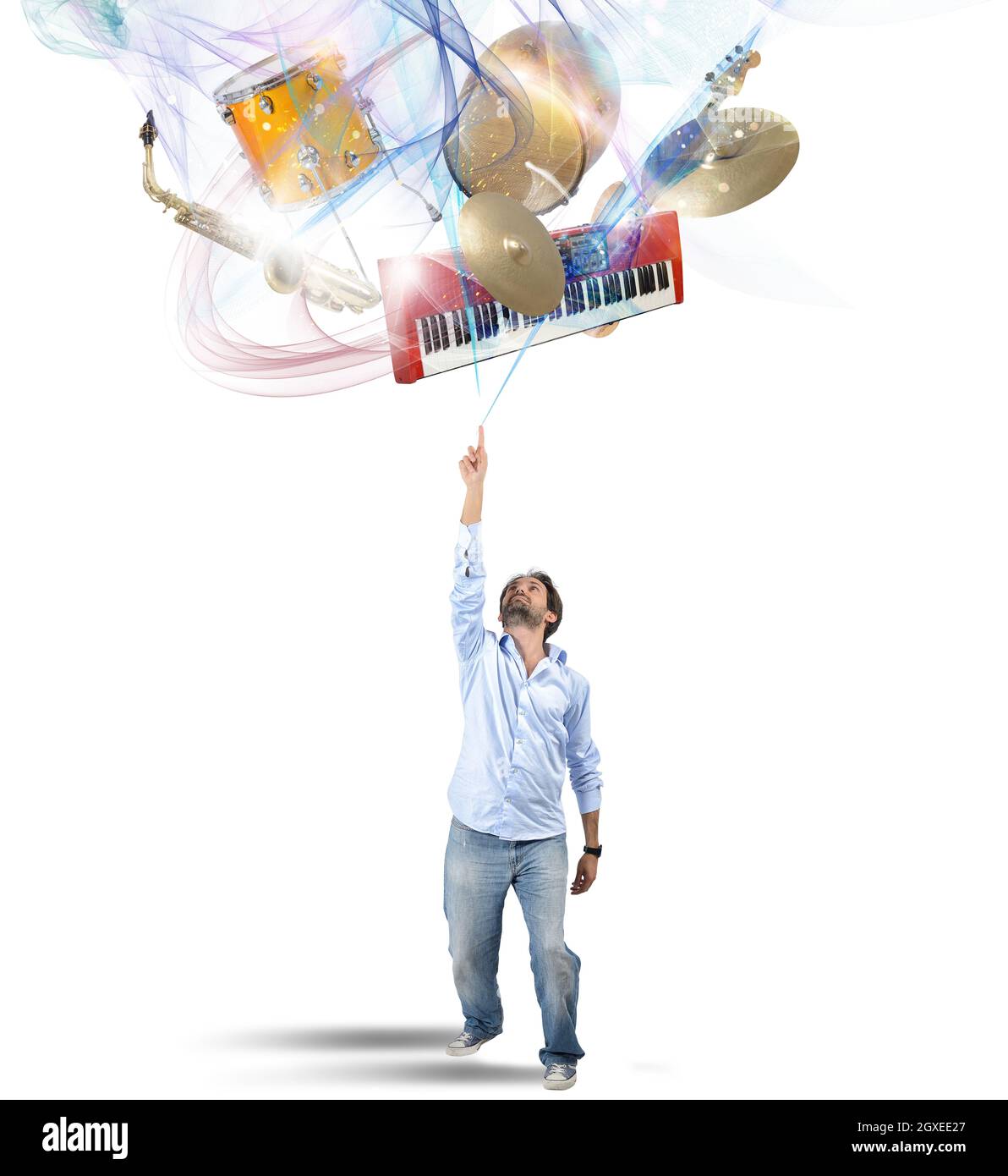 Il musicista sceglie il suo strumento nel vortice dei colori Foto Stock