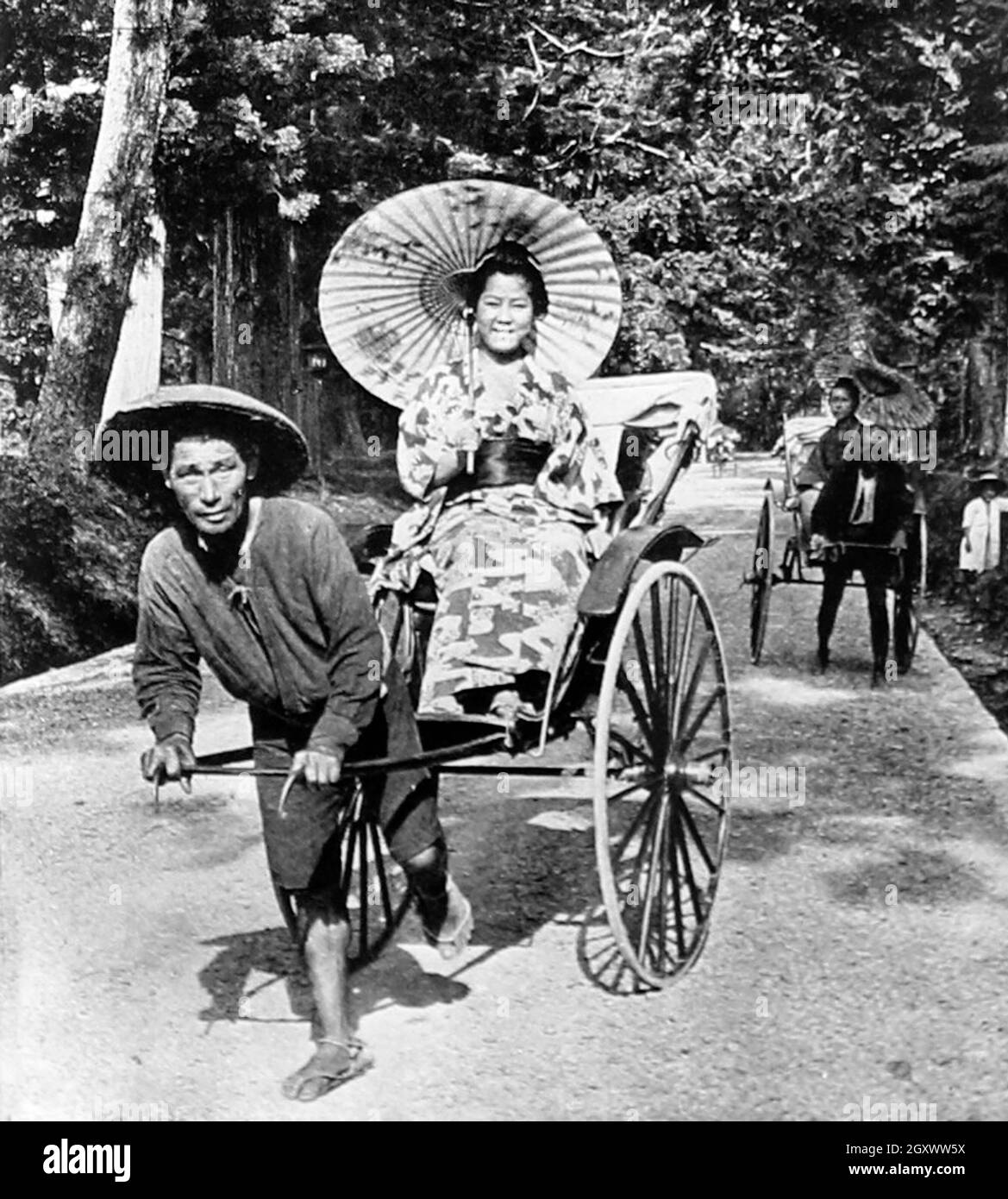 Risciò, Giappone, primi del 1900 Foto Stock