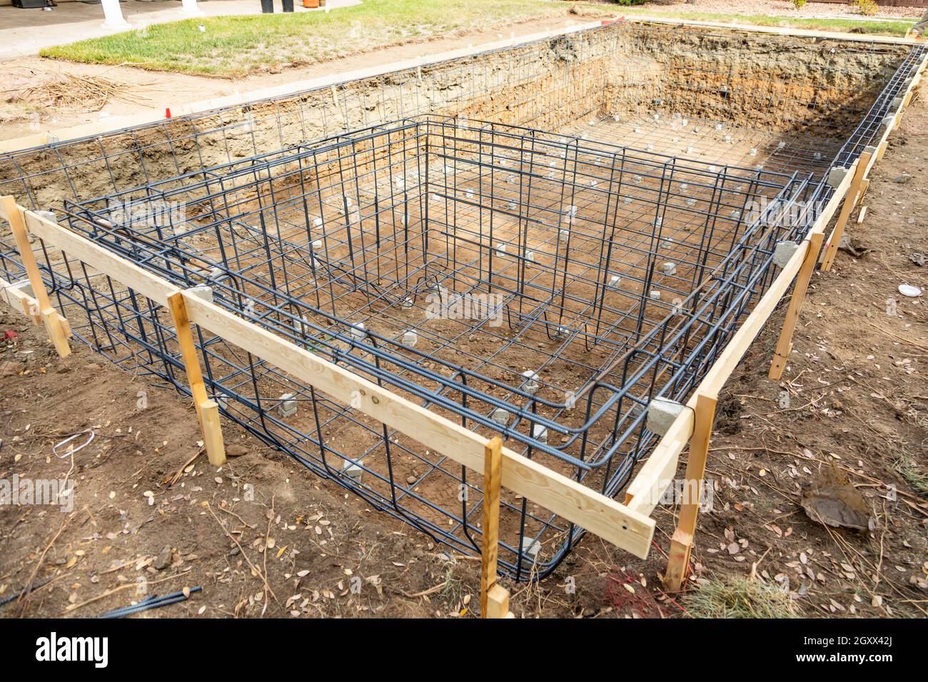 Nuova piscina Steel Rebar Framing Sito in costruzione. Foto Stock