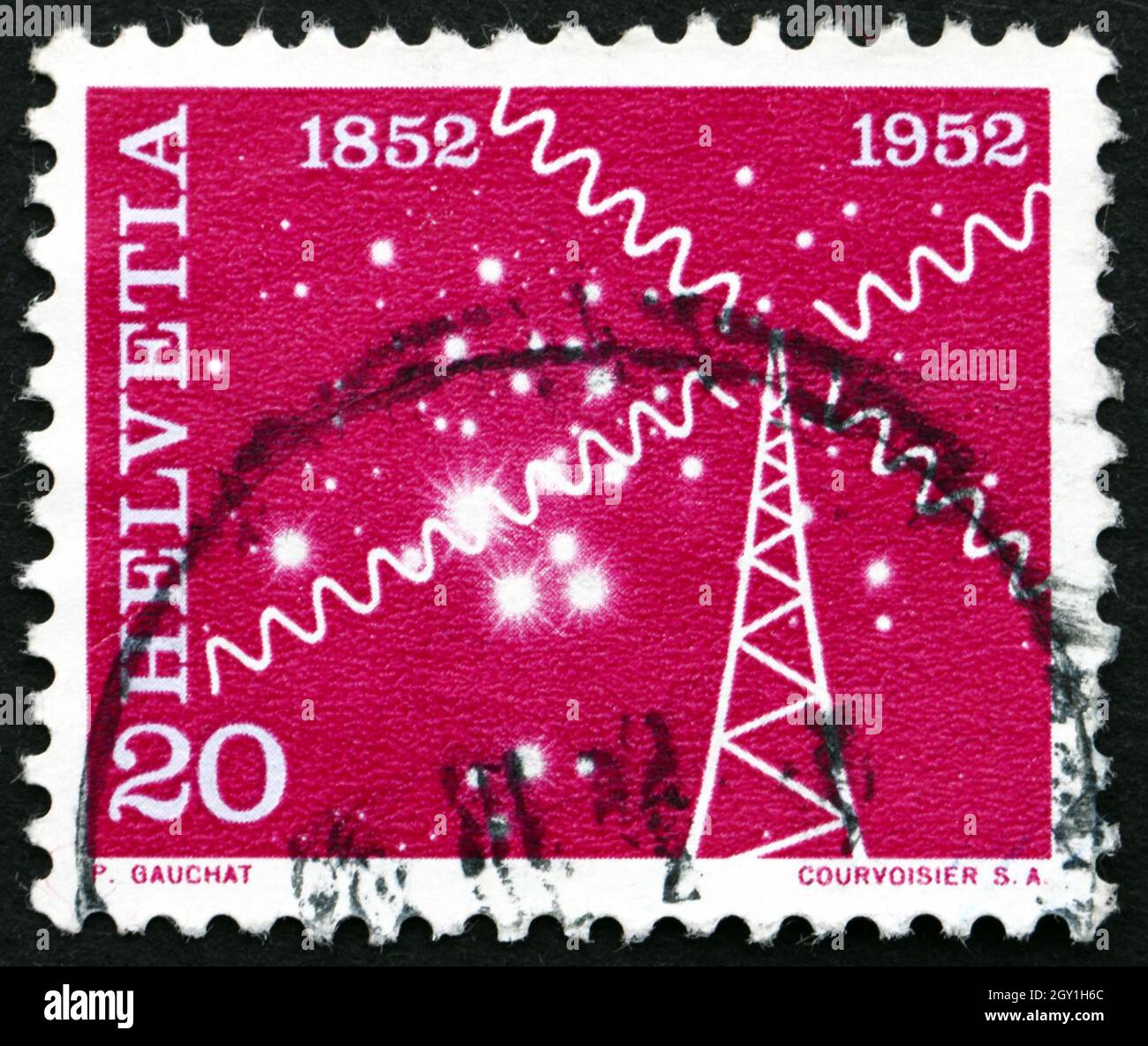 SVIZZERA - CIRCA 1952: Un francobollo stampato in Svizzera mostra il simbolo della radio, un secolo di telecomunicazioni, circa 1952 Foto Stock