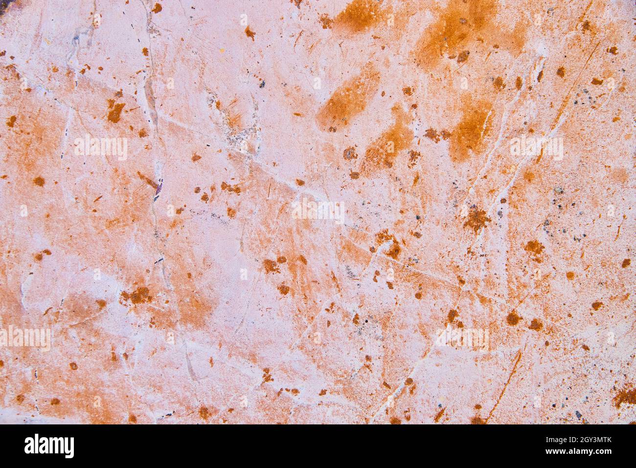 Texture di roccia da vicino con macchie rosa e arancione Foto Stock