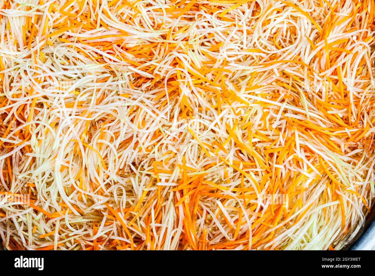 carota grattugiata e rapa nel mercato asiatico Foto Stock