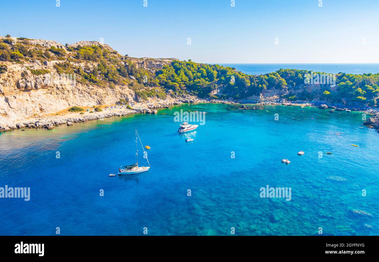 Anthony Quinn Bay con acque turchesi a Faliraki su Rodi Grecia. Foto Stock