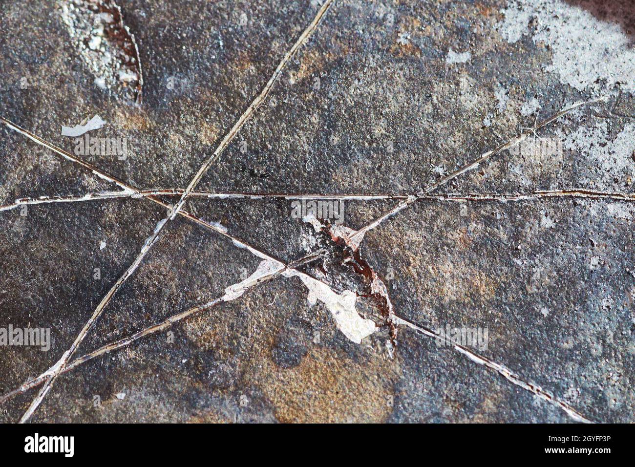 Texture dettaglio macro di disco rigido bruciato e graffiato Foto Stock
