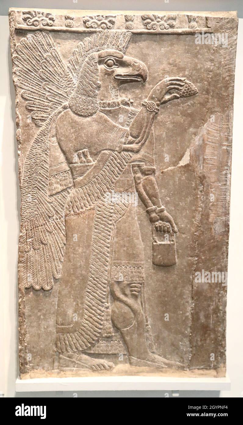 Spirito protettivo assiriano a testa di aquila da Nimrud, Tempio di Ninurta, al British Museum, Londra, Regno Unito Foto Stock
