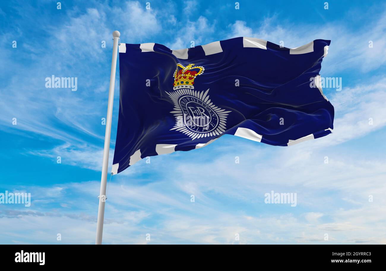 Bandiera del Servizio Metropolitan di polizia a cielo nuvoloso sfondo al tramonto. Vista panoramica. regno unito di gran Bretagna, Inghilterra. Spazio copia per w Foto Stock