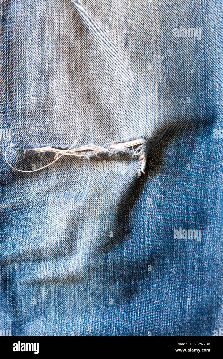 Denim vintage strappato e sbiadito Foto Stock