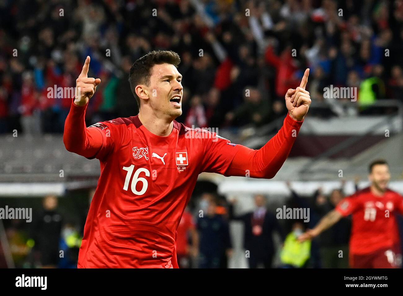 La Svizzera Christian Fassnacht festeggia il secondo obiettivo del gioco durante la partita di qualificazione della Coppa del mondo FIFA allo Stade de Geneve, Svizzera. Data foto: Sabato 9 ottobre 2021. Foto Stock