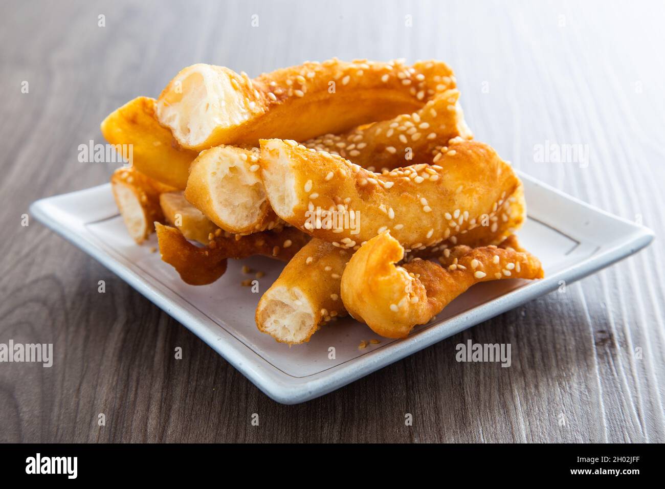 Horse Shoe Fritters, noto anche come ma Geok o Butterfly, un popolare cibo fritto tra i cinesi Foto Stock