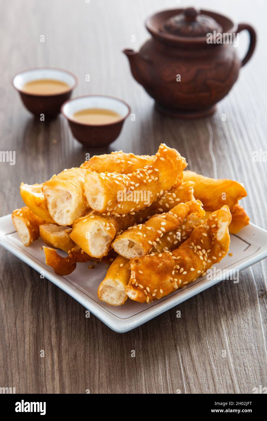 Horse Shoe Fritters, noto anche come ma Geok o Butterfly, un popolare cibo fritto tra i cinesi Foto Stock