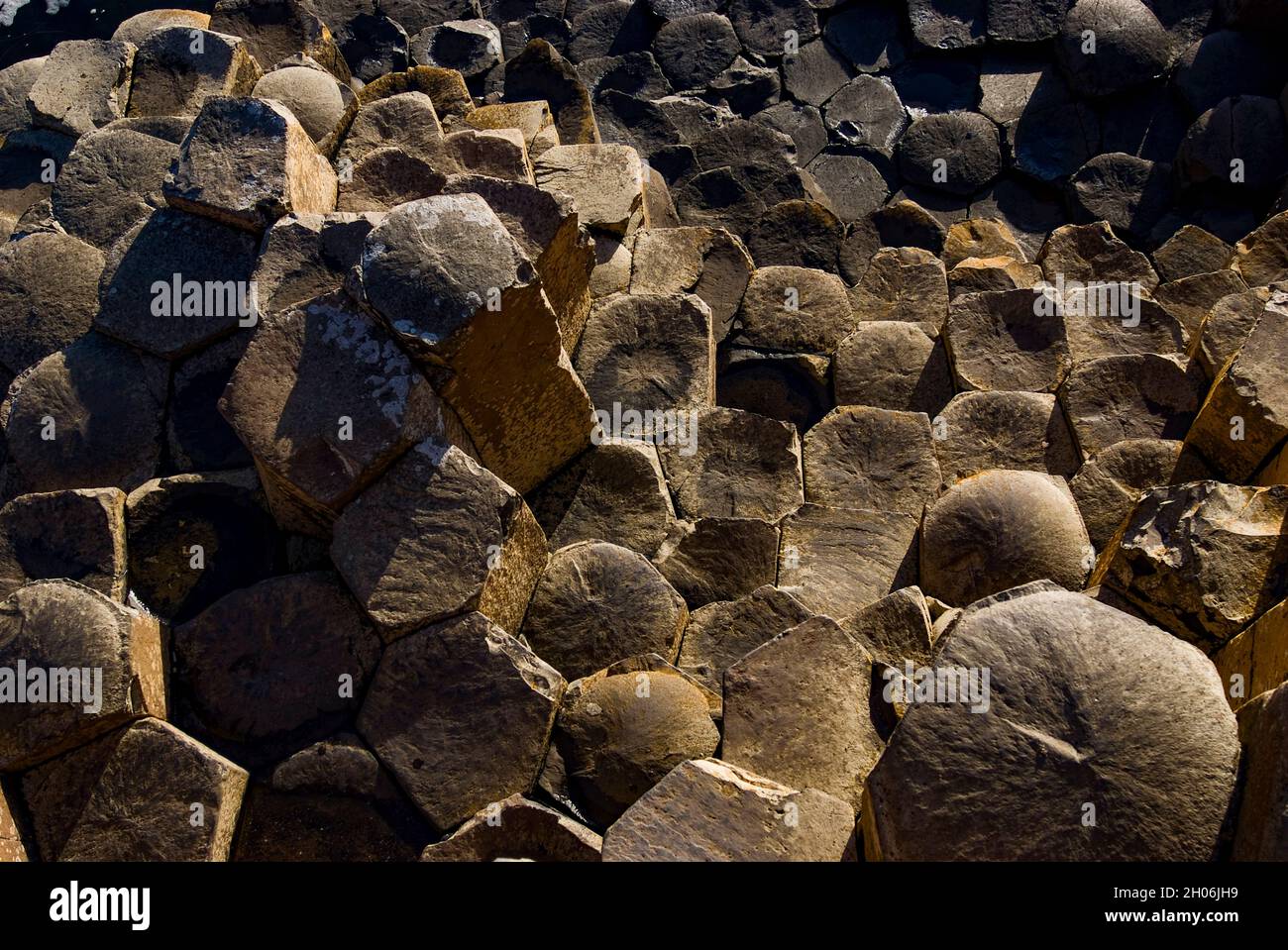 Tramonto al Selciato del gigante, contea di Antrim, Irlanda del Nord Foto Stock