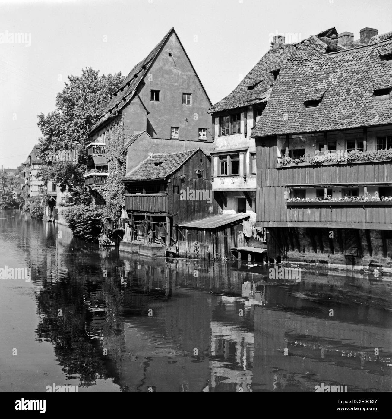 Die Pegnitzinsel in der Altstadt von Nürnberg, Deutschland 1930er Jahre. Penisola di Pegnitz presso la vecchia città di Norimberga, Germania 1930s. Foto Stock