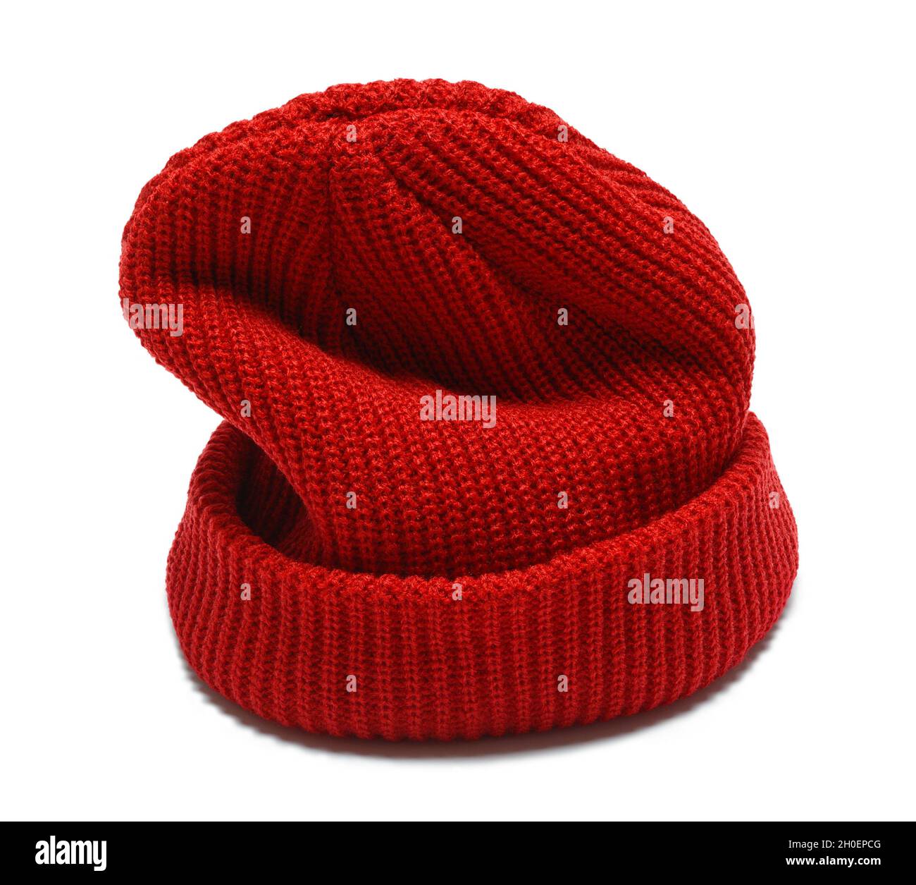 Cappello rosso in maglia da stuocco tagliato su bianco. Foto Stock
