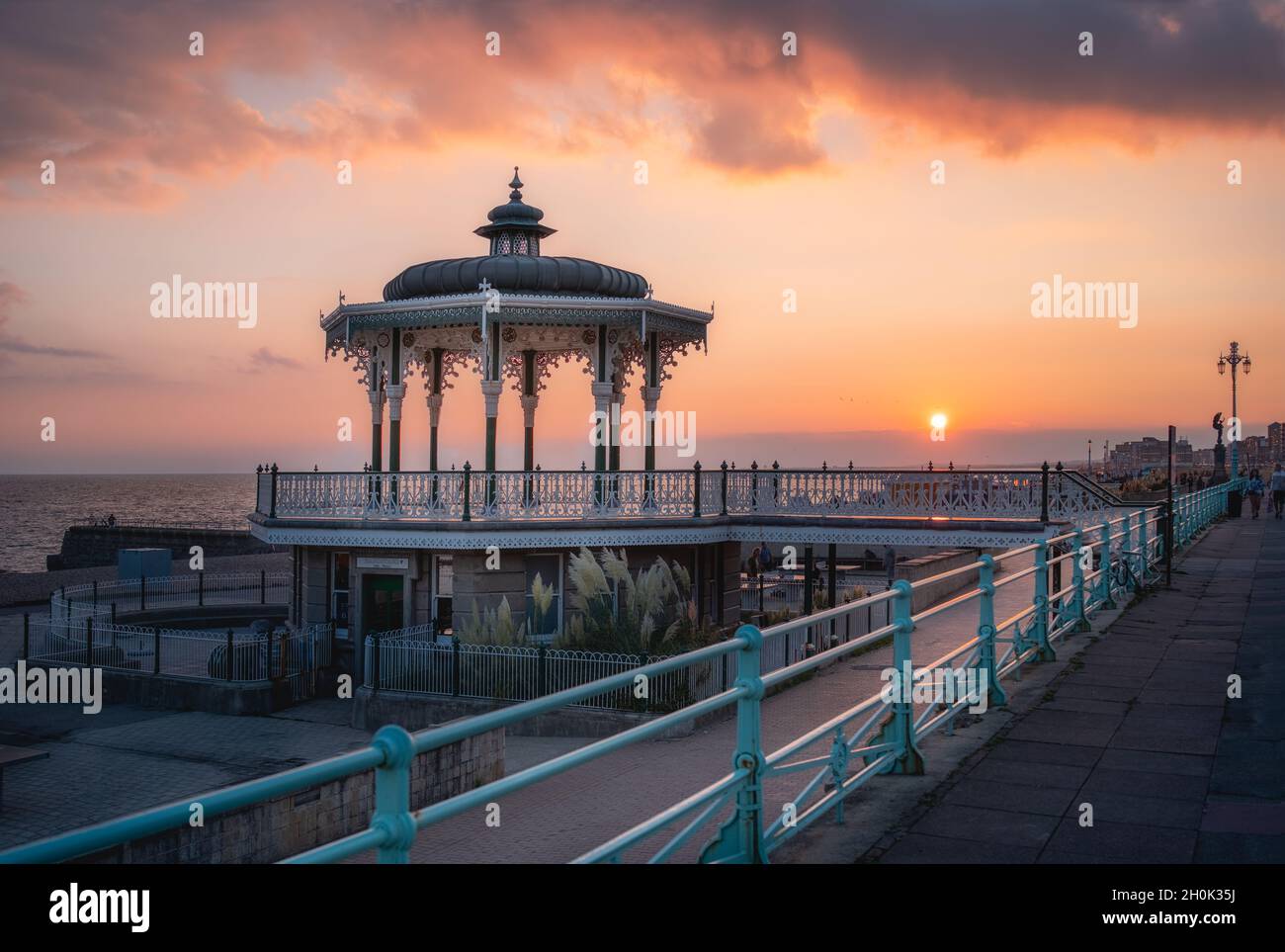 Tramonto al Brighton Bandstand Foto Stock