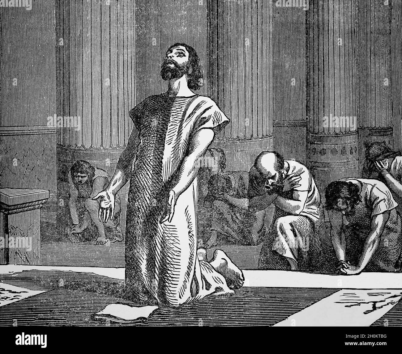 Un'illustrazione del tardo XIX secolo dei Libri dei Re e delle Cronache, nel vecchio Testamento, di Ezechia, figlio di Achaz e del XIII re di Giuda, che deposita le lettere di Sennacherib davanti al Signore. Fu re di Giuda durante l'assedio di Gerusalemme nel 701 a.C. da parte di Sennacherib, che inviò lettere minacciose che avvertirono Ezechia della sua determinazione a prendere la capitale della Giudea. Sebbene assediassero Gerusalemme, i resoconti biblici affermano che Dio mandò un angelo che, in una notte, abbatté 'centottantacinquemila nel campo degli Assiri'. Foto Stock