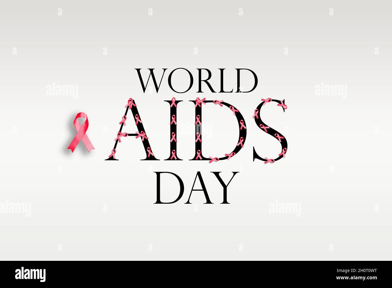 Testo della Giornata Mondiale dell'AIDS su sfondo grigio Foto Stock