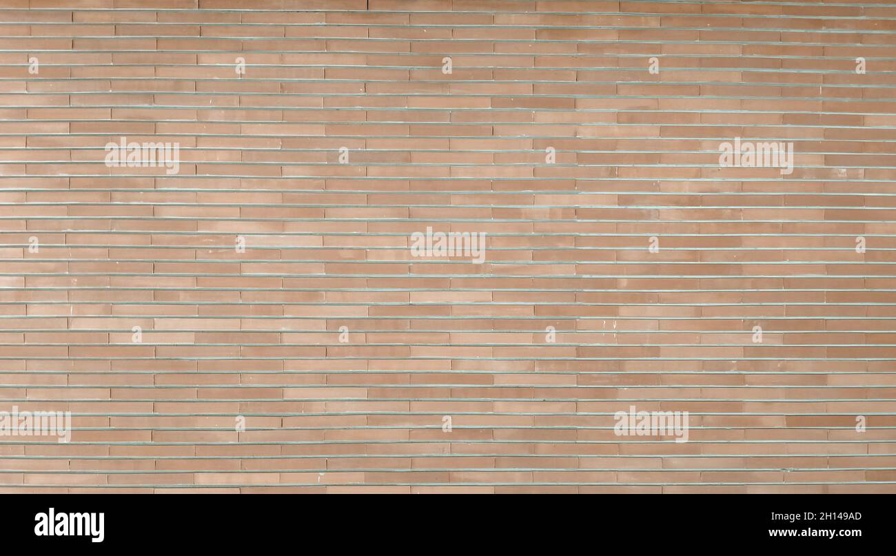 sfondo muro di mattoni. Vecchio muro di mattoni grunge sfondo in marrone grigio Foto Stock