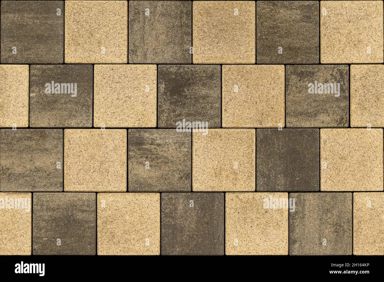 piastrelle di colore grigio scuro e giallo con layout senza cuciture hopscotch Foto Stock