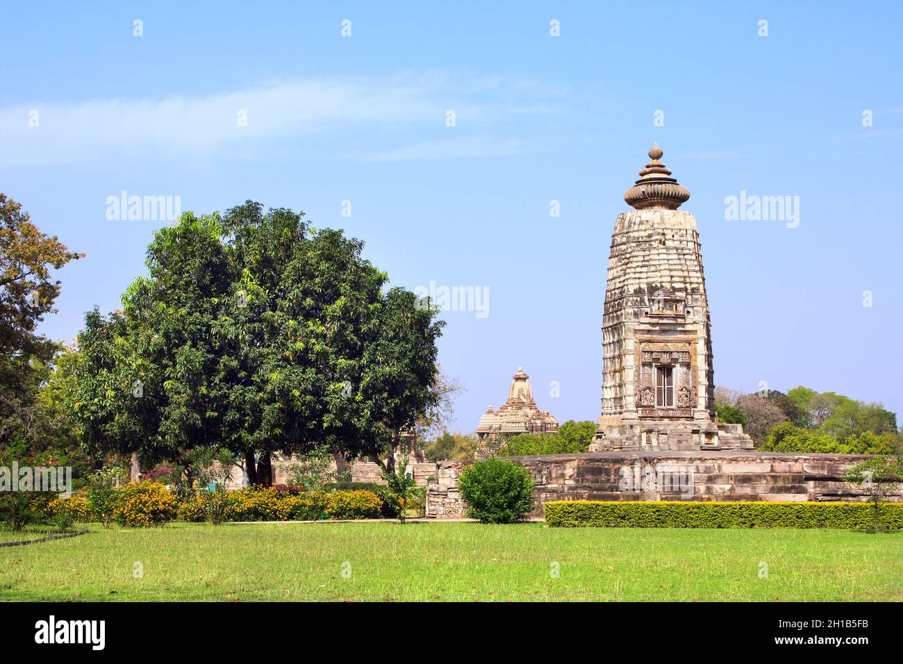 Antichi templi in pietra a Khajuraho, Madya Pradesh, India. Sito patrimonio dell'umanità dell'UNESCO Foto Stock
