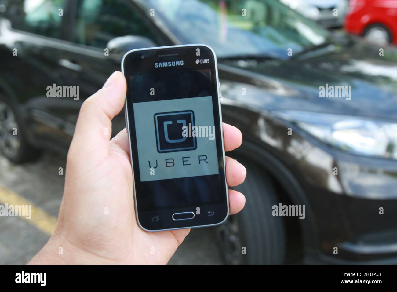 salvador, bahia / brasile - 21 giugno 2016: Uber driver applicazione, il trasporto di passeggeri è visto nella città di Salvador. *** Local Caption *** Foto Stock