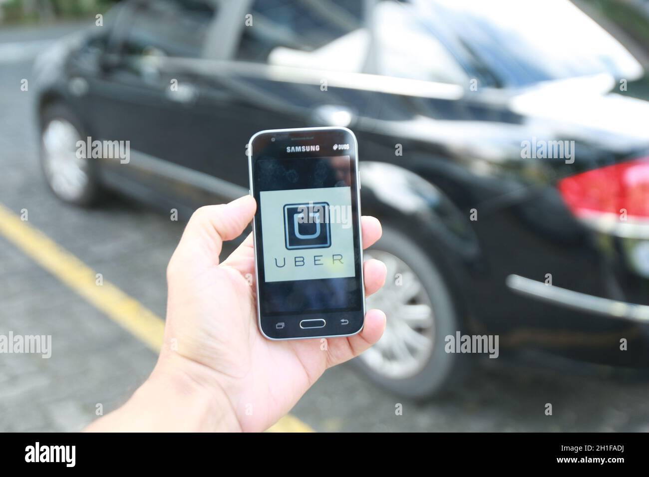 salvador, bahia / brasile - 21 giugno 2016: Uber driver applicazione, il trasporto di passeggeri è visto nella città di Salvador. *** Local Caption *** Foto Stock