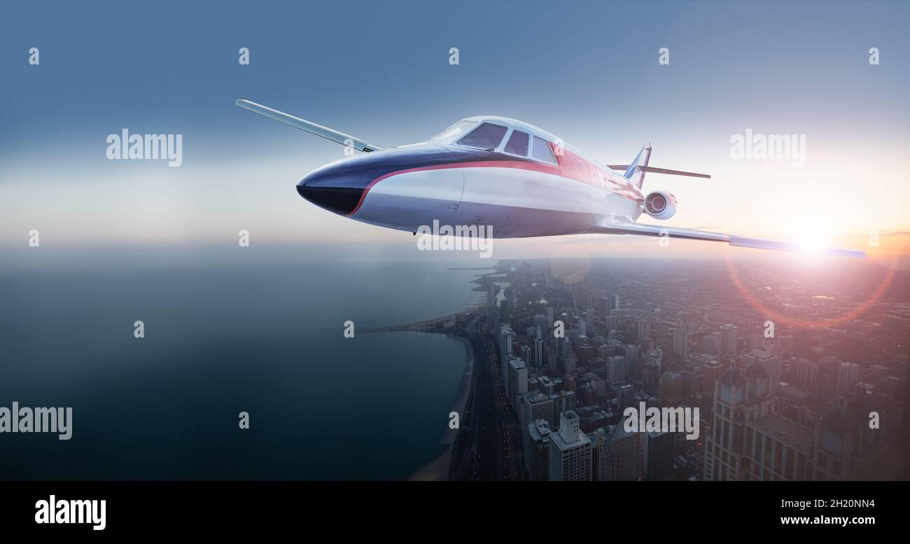 Un piccolo aereo jet business vola sul centro di Chicago Foto Stock