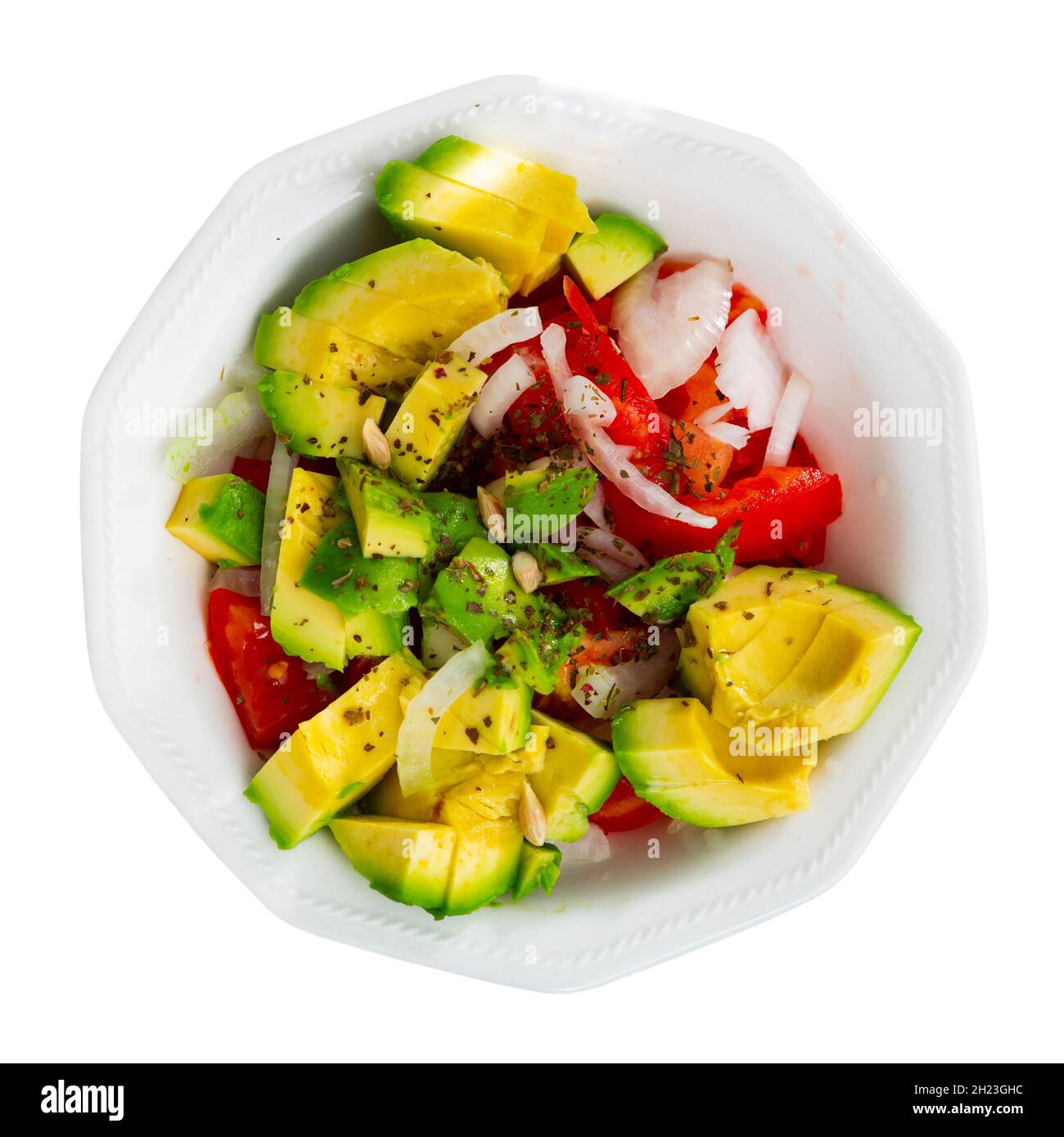 Insalata di verdure sane di pomodori freschi a fette, avocado e cipolla Foto Stock